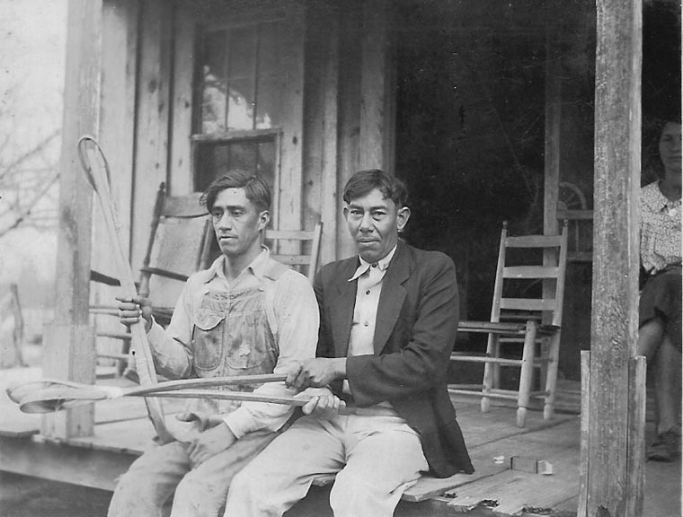 Merlin Pierite and Joseph Pierite holding stickball racquets, ca. 1930. (Photo: Frank Speck, Gregory Collection, Northwestern State University.)